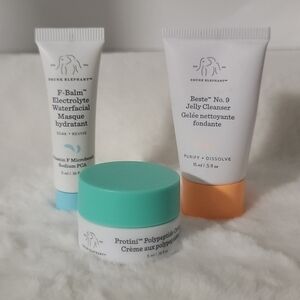 Drunk Elephant Skincare Set with White, Teal, and Orange Packaging